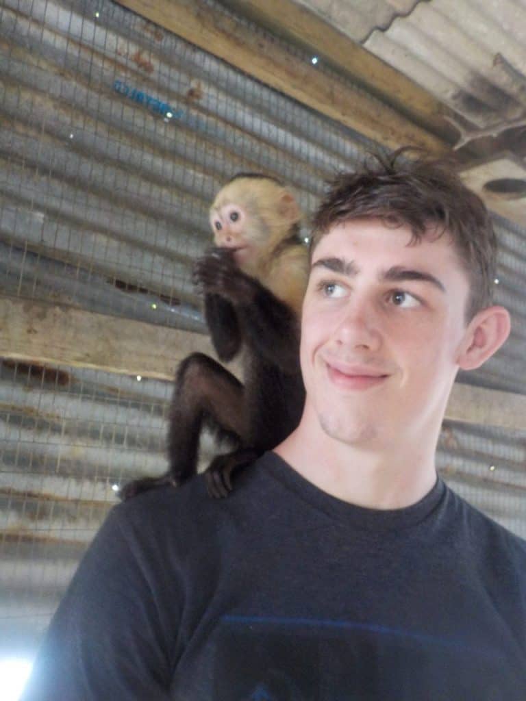 Sloths and Monkeys: The Best Mahogony Bay Excursion 10 Hold a monkey, Roatan