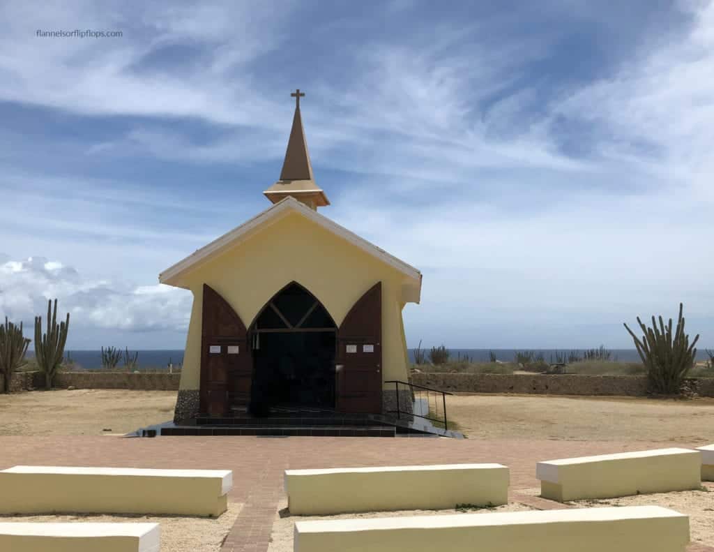 Aruba in One Day: Aruba UTV Tour Review (Aruba ATV Review) 11 A small Catholic chapel stands alone on a bluff with its bright yellow walls welcoming you in. It is absolutely gorgeous.