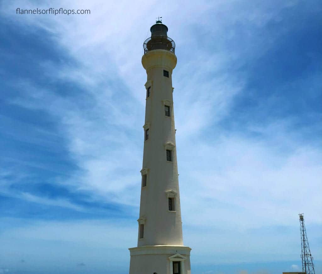 Aruba in One Day: Aruba UTV Tour Review (Aruba ATV Review) 12 The California Lighthouse in Aruba stands tall against a clear sky.
