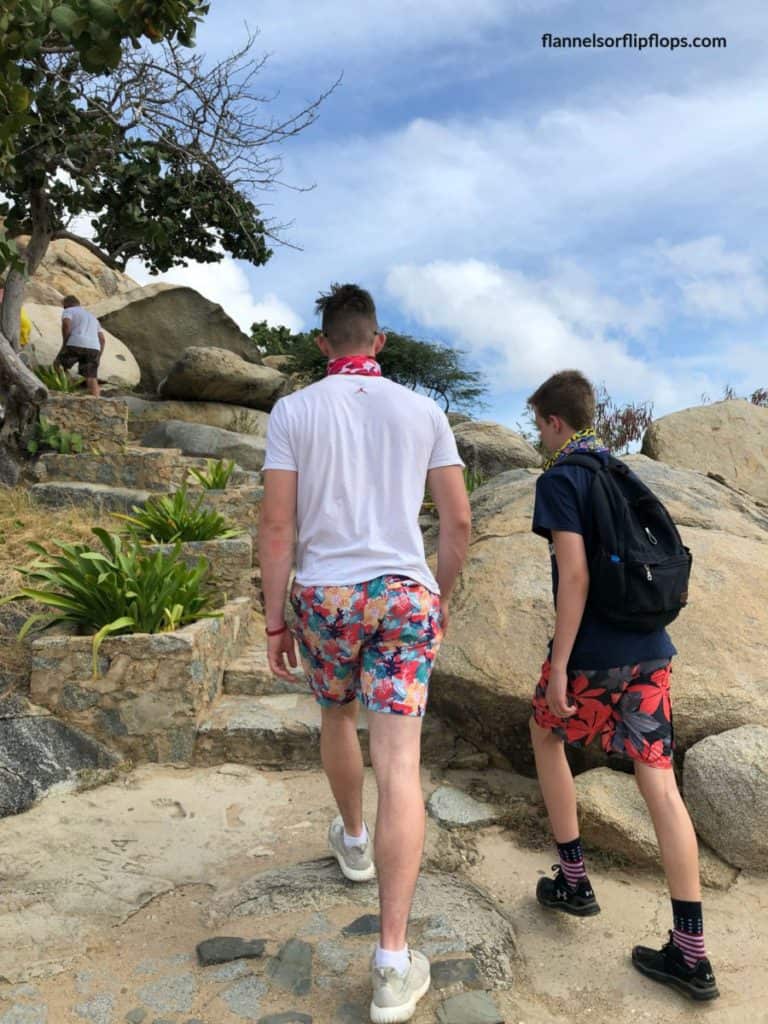 Aruba in One Day: Aruba UTV Tour Review (Aruba ATV Review) 6 boys climbing Casabari Rock in Aruba