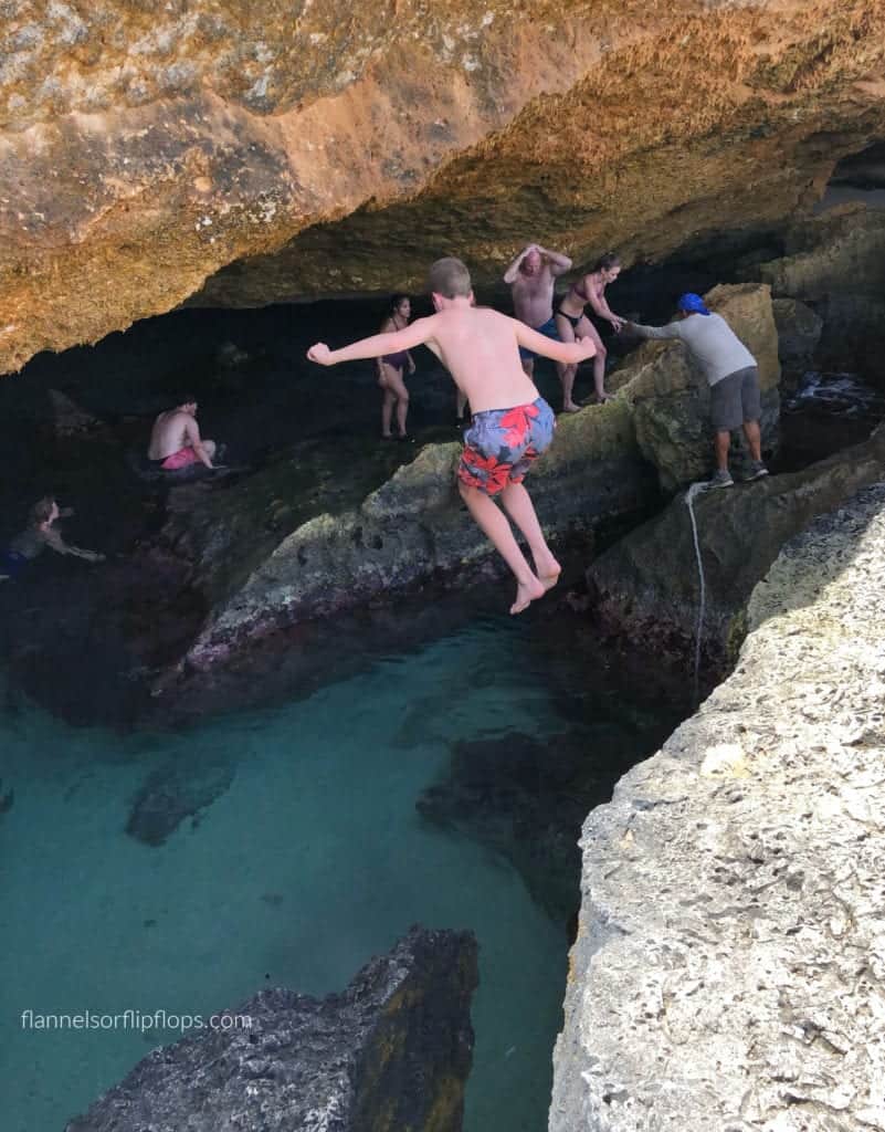 Aruba in One Day: Aruba UTV Tour Review (Aruba ATV Review) 10 My family and friends gathered at Conchi, Aruba's hidden natural pool, with its crystal blue waters, encircled by rugged terrain.