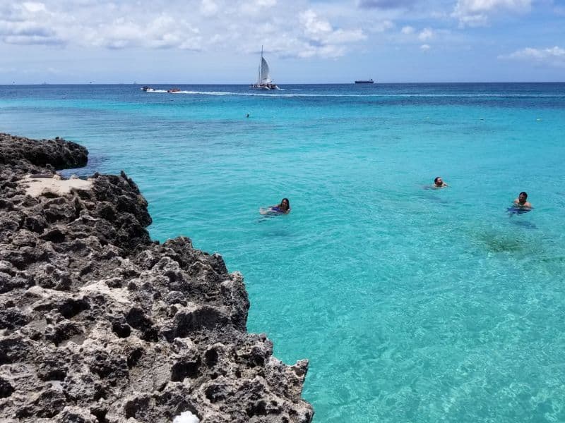 Aruba in One Day: Aruba UTV Tour Review (Aruba ATV Review) 2 My family enjoying a swim in the clear, turquoise waters of Aruba.