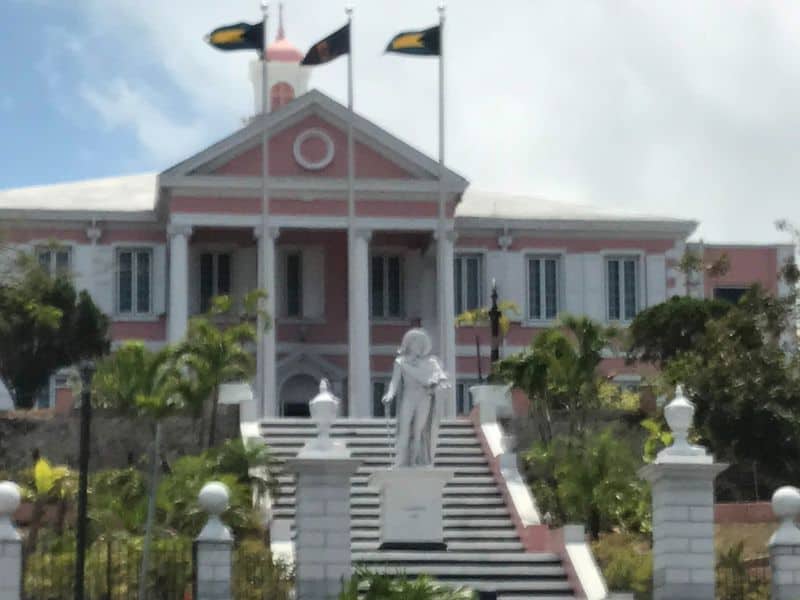 Is Nassau Worth It? Should You Stay On The Ship? 10
An image of the Parliament Building, showcasing its distinctive colonial architecture and vibrant pink façade in Nassau.