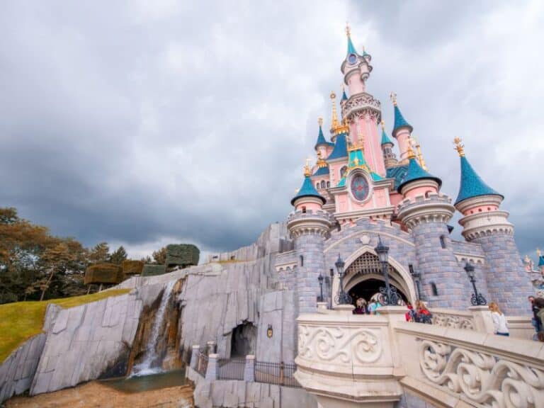 A majestic Castle shining at Disney Paris.
