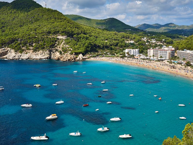 Exploring Cruise Ports in Spain: All you need to Know 10 Boats anchored off the shore of Ibiza