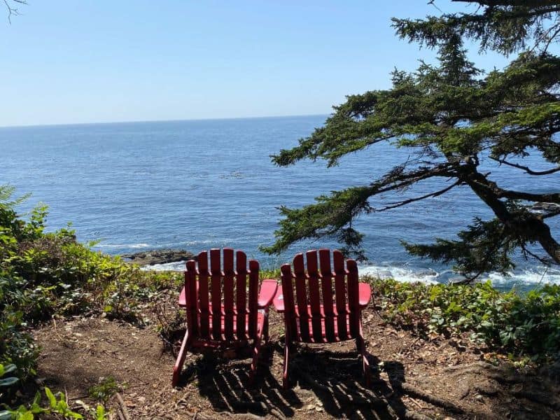 Is Vancouver Island Worth Visiting? 15 Reasons to visit! 2 Chairs overlooking the ocean at Pacific Rim National Park