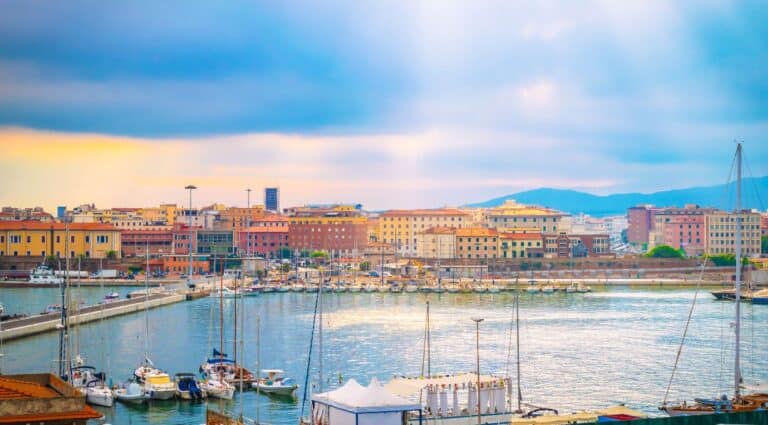 Sun shining on colorful buildings at the Livorno Cruise Port