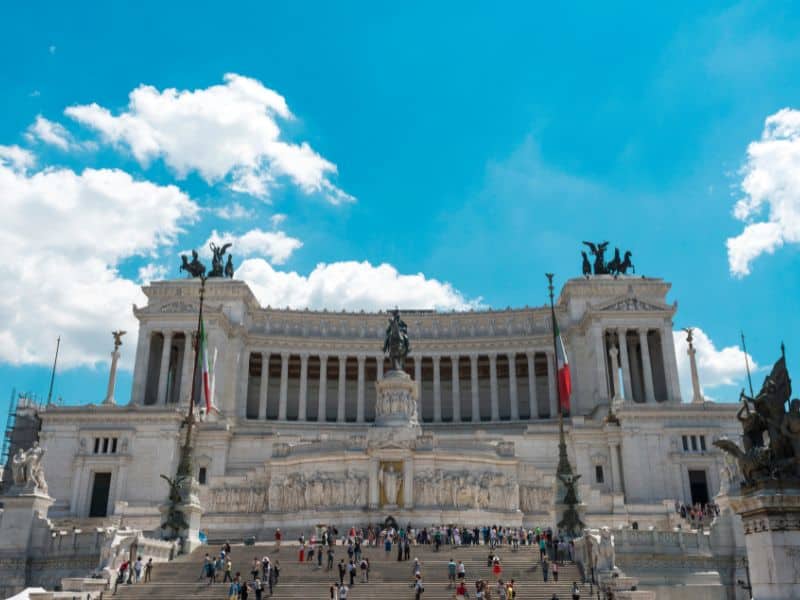 30 Famous Rome Italy Landmarks That You Must See 24 Immerse yourself in the lively energy of Piazza Venezia in Rome, where locals and tourists come together to admire the impressive Vittorio Emanuele Monument up close, snapping photos and marveling at its grandeur while soaking in the vibrant atmosphere of this bustling square.