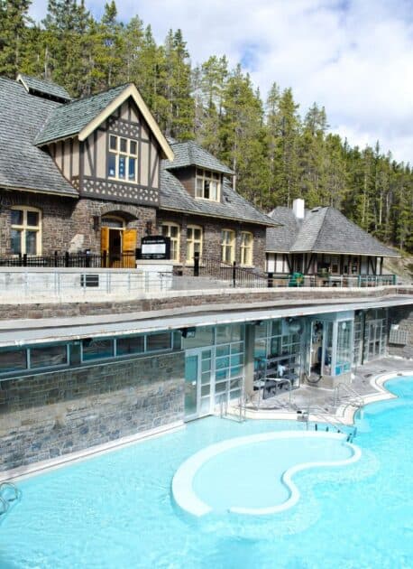 The soothing Banff Upper Hot Springs, surrounded by pristine nature, offering a relaxing experience with its warm mineral-rich waters.