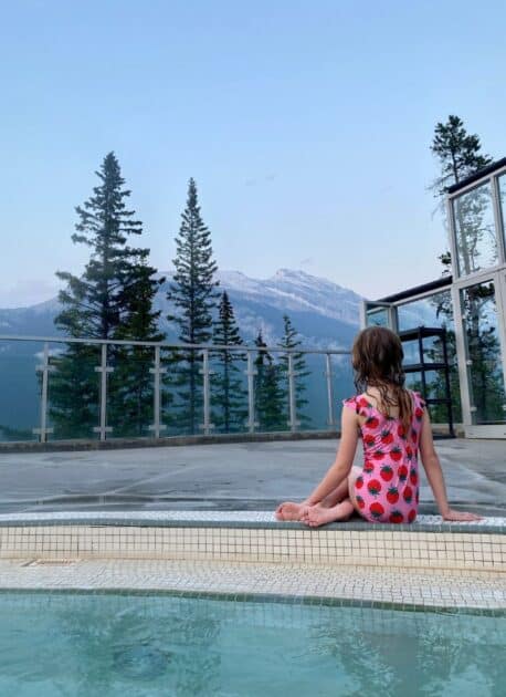 A girl enjoying the moment of relaxation and serenity with the perfect view of the nature.