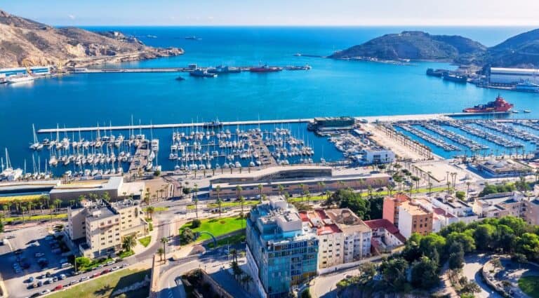 Aerial view of Cartagena, Spain's bay with yachts and cityscape.