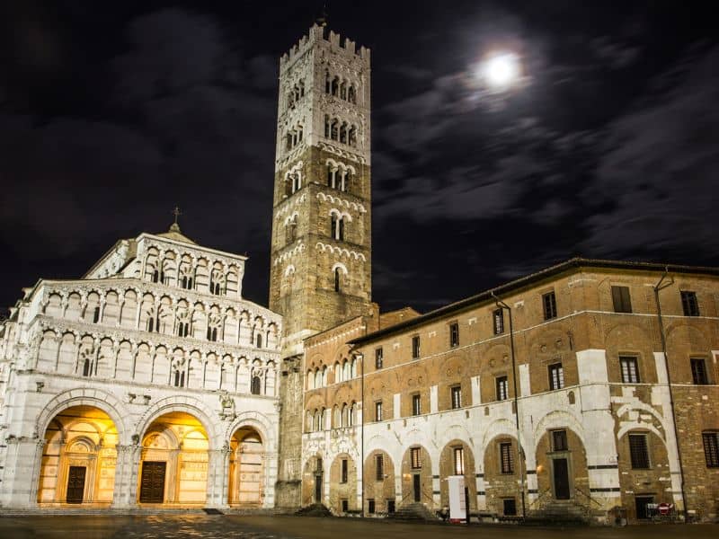 10 Best Livorno Shore Excursions 11 The enchanting Duomo di Lucca, located in Lucca, Italy, illuminated against the night sky, showcasing its stunning architecture and intricate details.