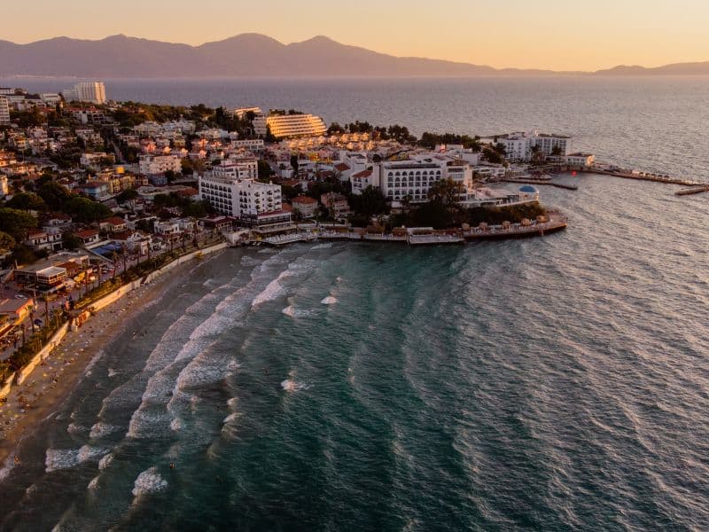 Ladies Beach in Kusadasi, Turkey, is a charming coastal haven known for its serene ambiance and captivating beauty. 