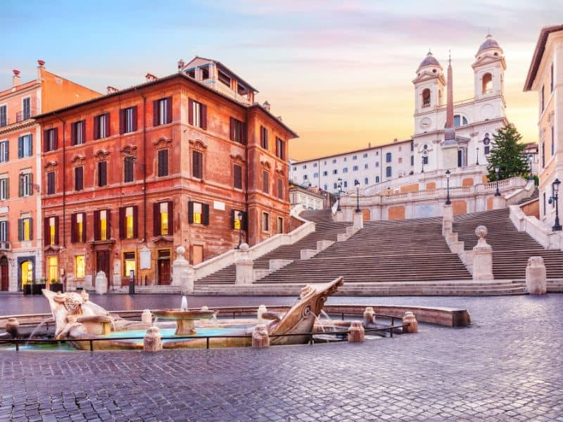 Civitavecchia Cruise Port Guide: Everything You Need to Know 7 Iconic Spanish Steps in Rome, Italy, surrounded by historic buildings and a grand staircase.