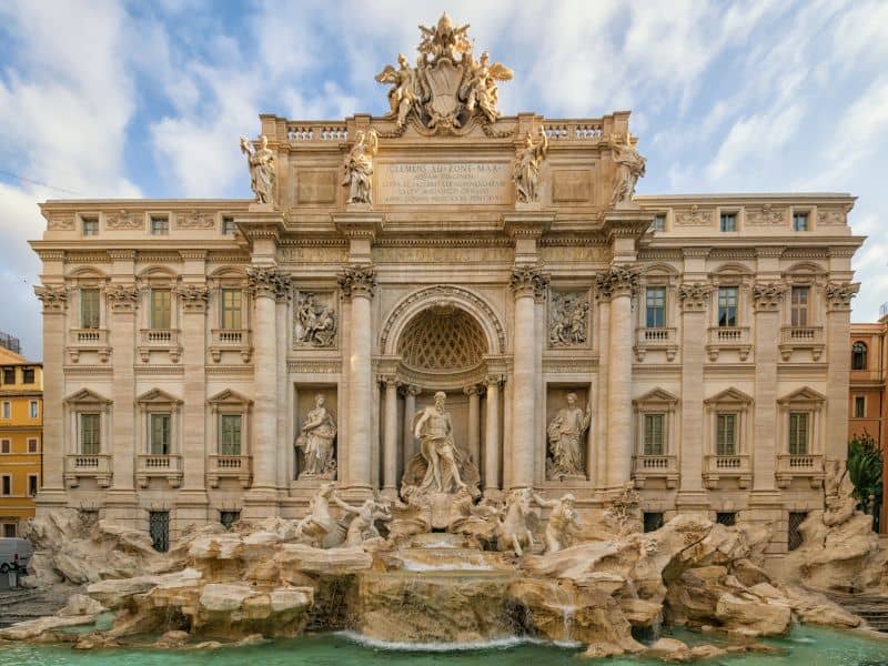 Majestic Trevi Fountain in Rome, Italy, featuring a stunning Baroque sculpture and grand architecture.