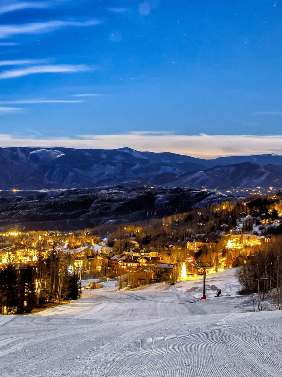 Aspen lights with snow and mountains