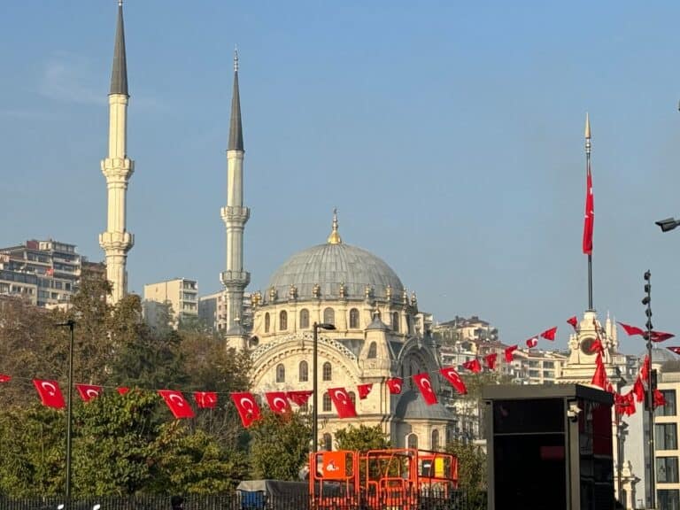 Mosque with Turrets and Turkish Flags in Istanbul