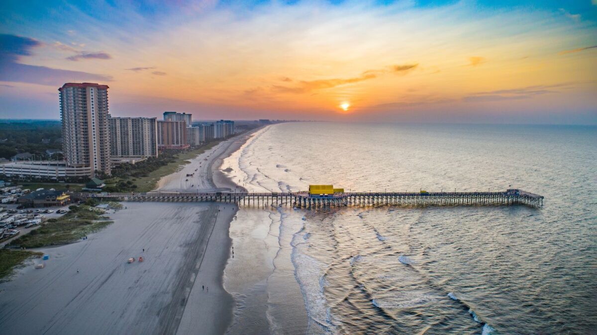 Are Aliens Among Us? Visit These US Places with the Most UFO Sightings! 6 drone shot of Apache Pier in Myrtle Beach at sunset