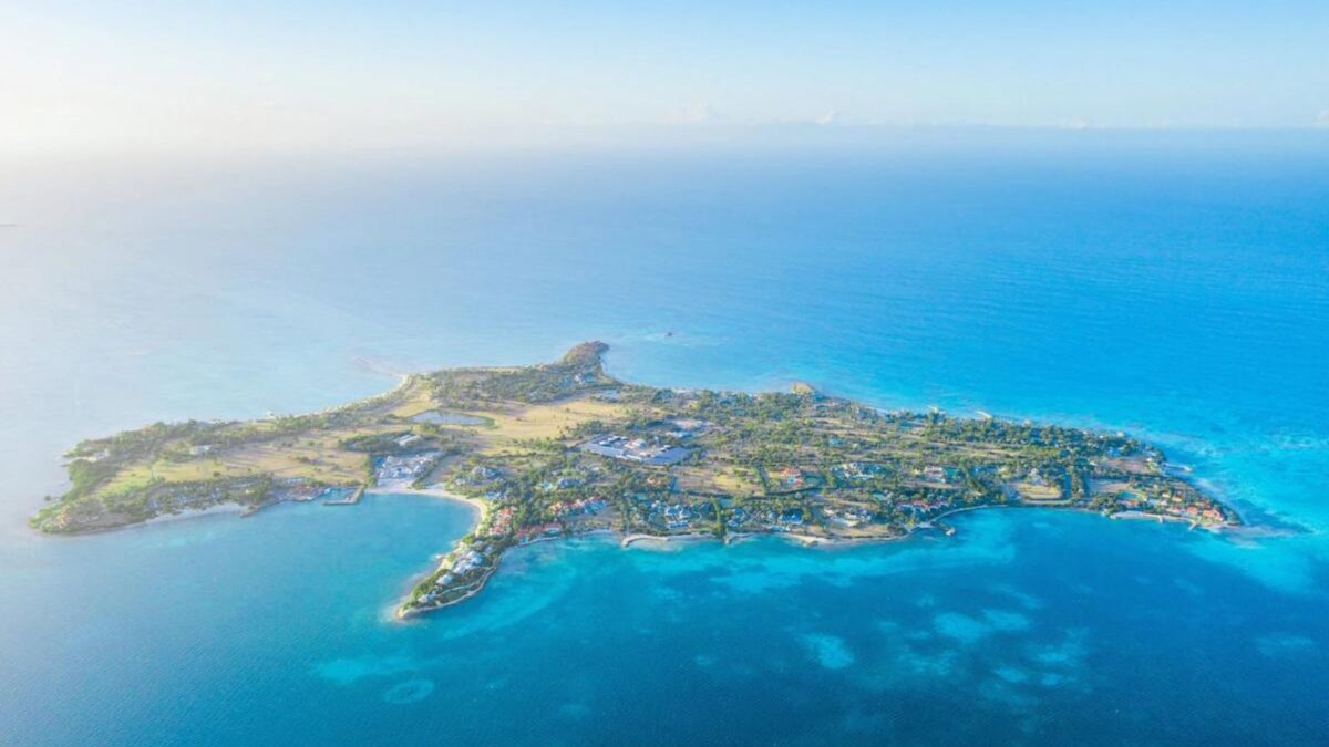 Aerial view of a lush, tropical peninsula.