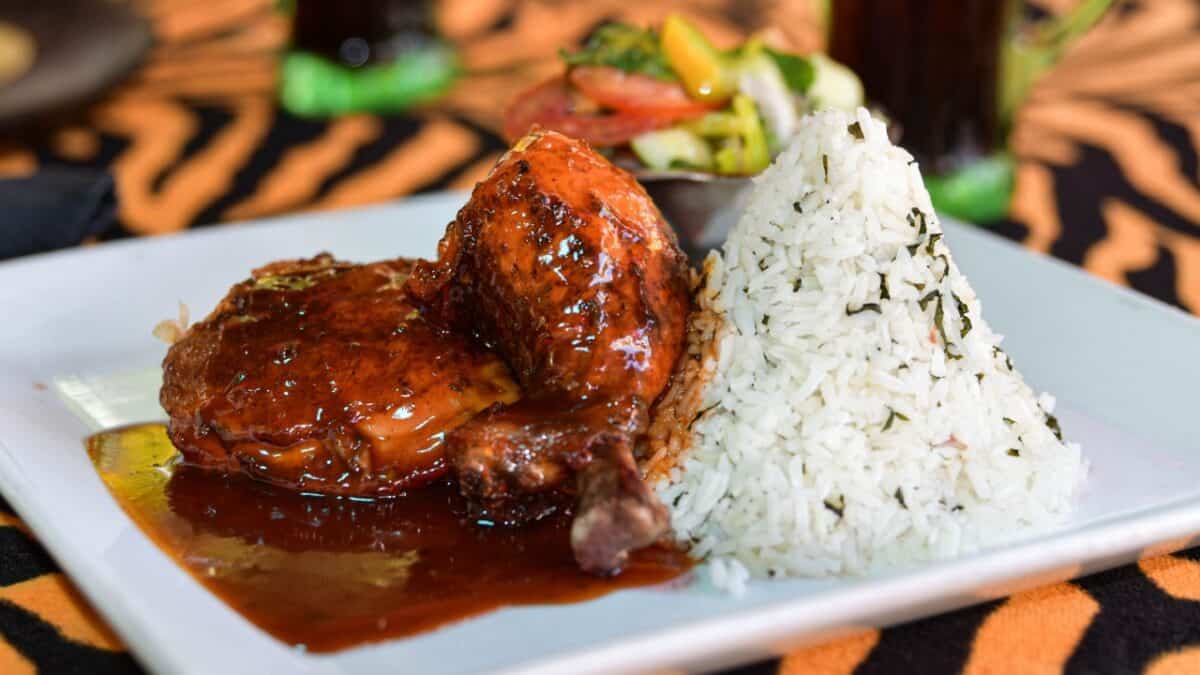 Discover the Central American Country You Need to Explore ASAP 6 Stewed chicken with rice on a plate.
