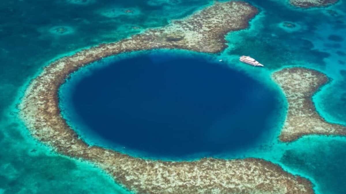 Discover the Central American Country You Need to Explore ASAP 4 Aerial view of the Great Blue Hole.