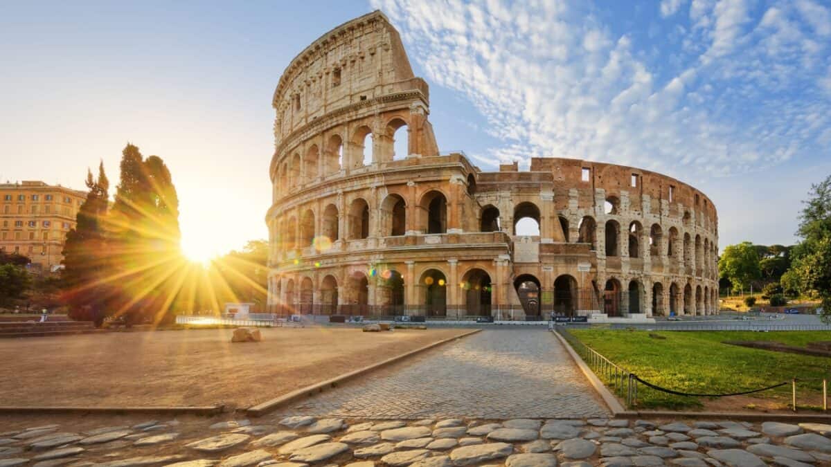 20 Phrases You Should Learn Before You Visit Italy 22 Golden hour at the colosseum: the ancient roman amphitheater basks in the warm glow of the setting sun.