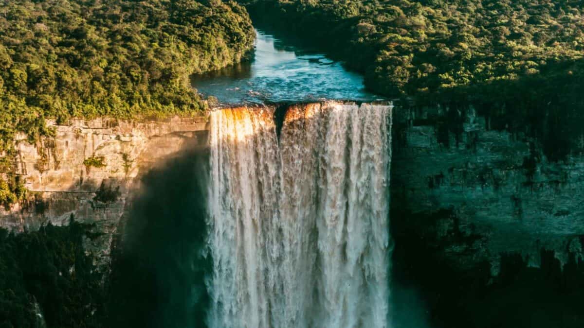 Tall waterfalls with turquoise waters - 15 Magical Waterfalls Perfect for a Refreshing Swim