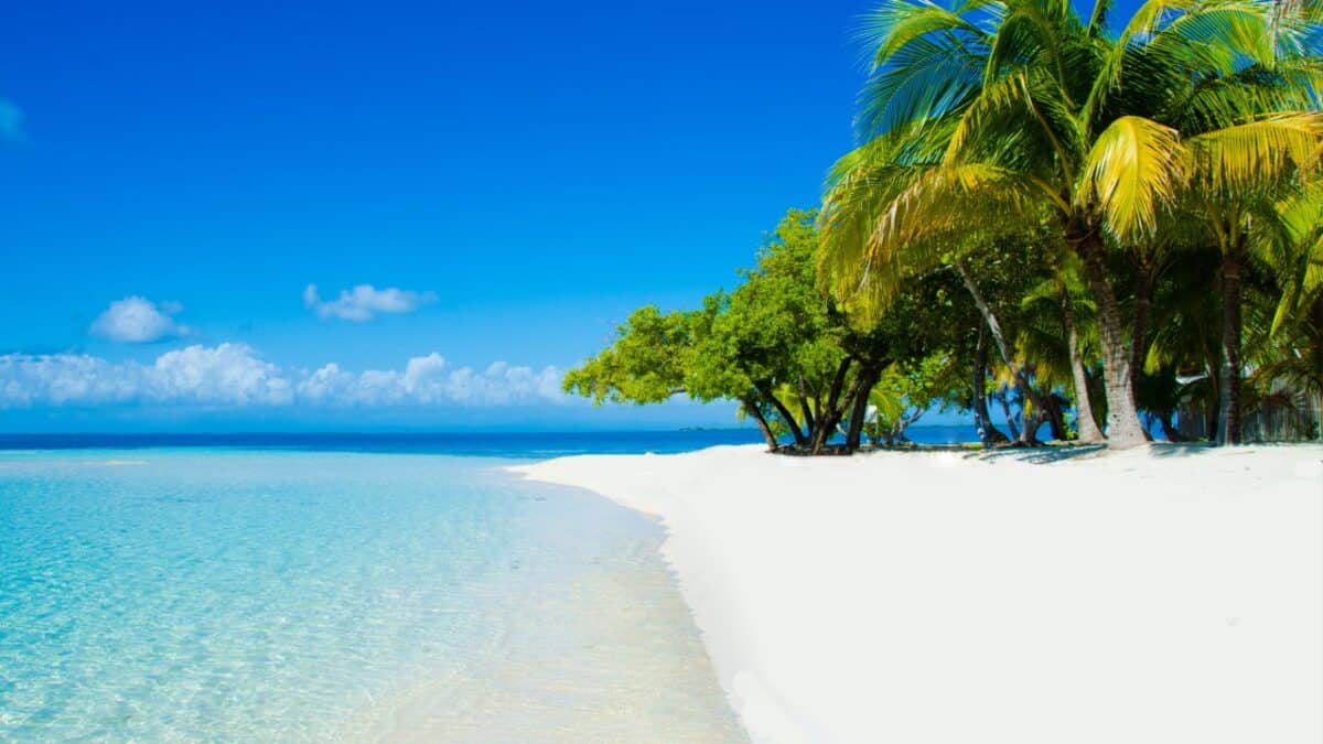 Discover the Central American Country You Need to Explore ASAP 5 Beach in Belize with white sand.