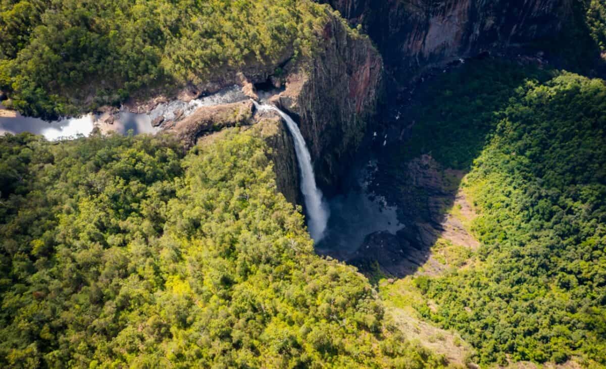 Wallaman Falls in Australia, a tall yet narrow waterfalls in the middle of the mountains.