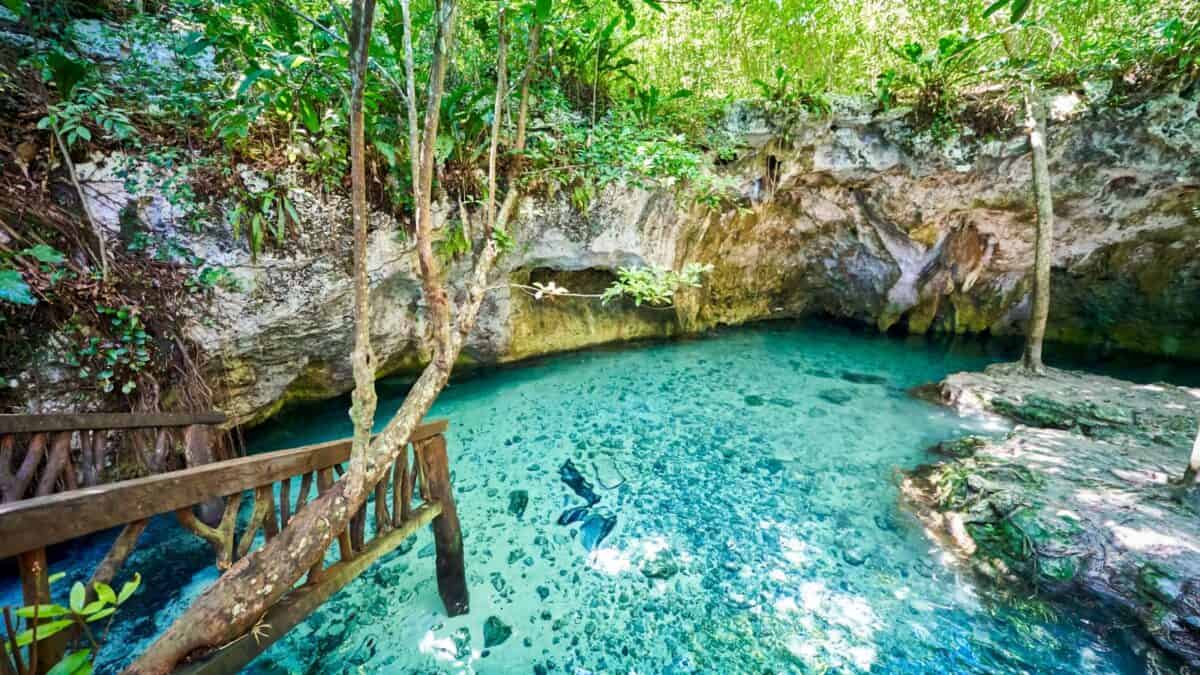 Gran Cenote in Mexico with turquoise waters.