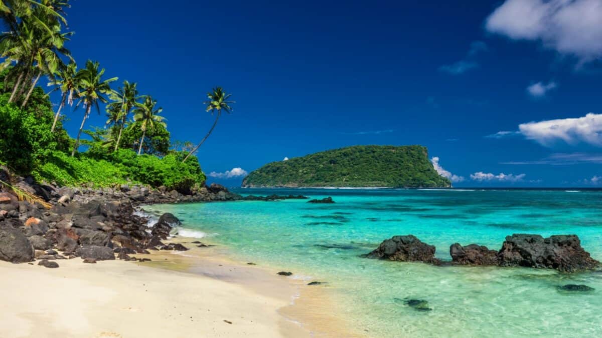 16 Survivor Locations that Would Actually Make Super Cool Vacation Destinations 14 A beach in Samoa with turquoise waters of the beach.