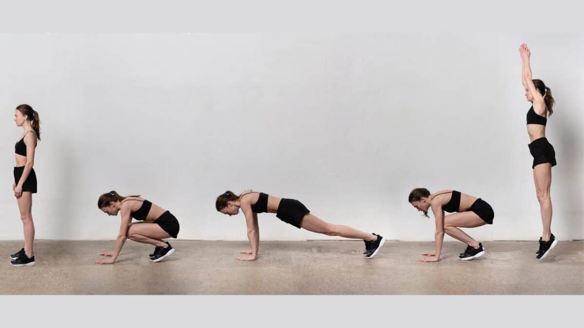 A woman demonstrates a burpee sequence from standing to jumping against a gray background.